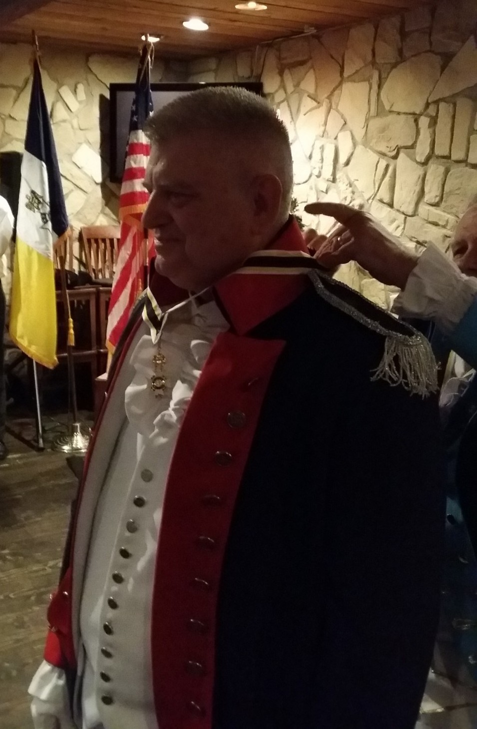 Wayne Courreges Receives Chapter President Neck Ribbon
